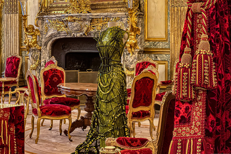 Green dress in the royal rooms of the Louvre Museum