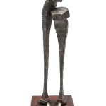 Statue of two nails standing side by side