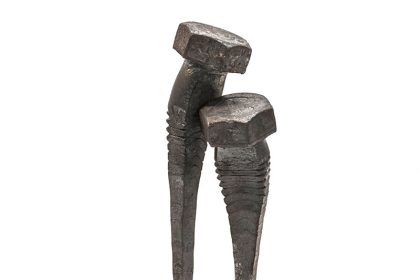 Statue of two nails standing side by side