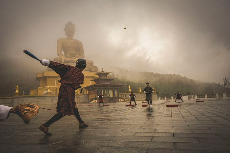 Playing in the vicinity of the Buddha statue in butane; Photographer: Matthew Desantis from <a href=
