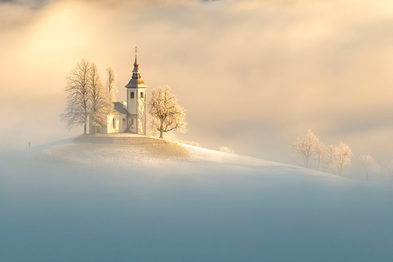 The building of the church drowning in the fog; Photographer: NGAR SHUN VICTOR WOND OF HANG KAH