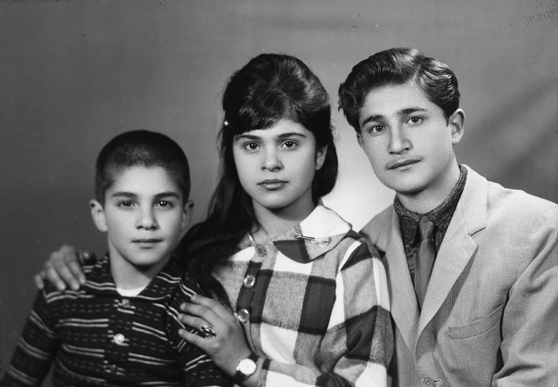 The black and white photo of a three -person family