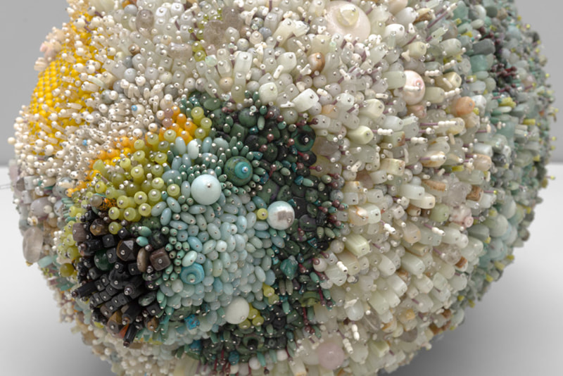 Decorating Jewelry on Moldy Fruit from Near Facade