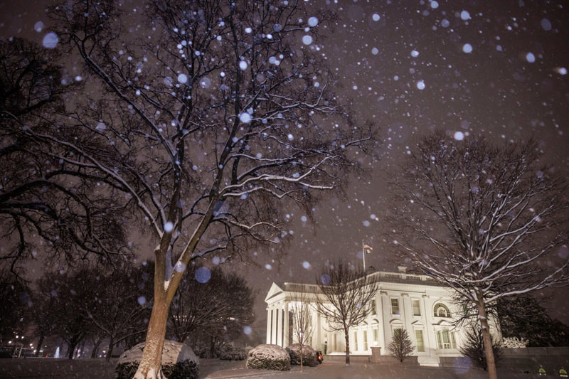 Snowfall around the White House building, America; Photo Source: Theguardian; Name of Photographer: ting Shen