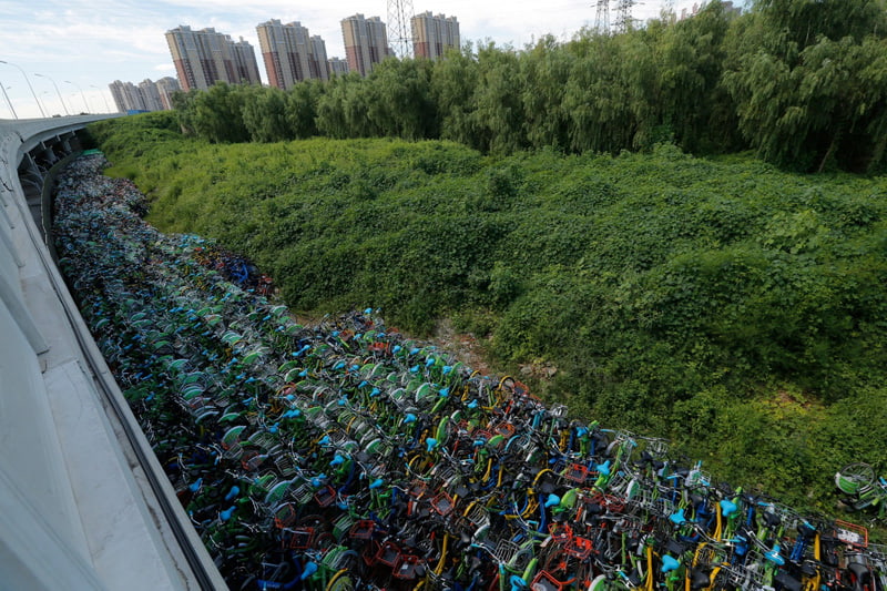 Thousands of bicycles near the air bridge in Beijing; Photographer: wu hong