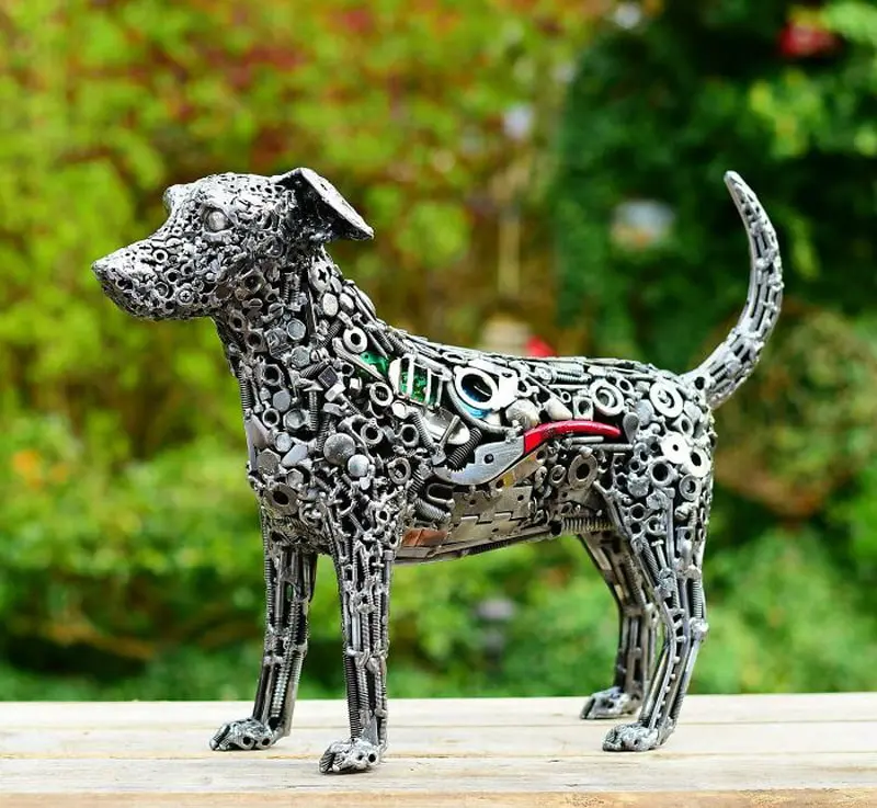 Dog statue with recycled materials