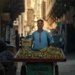 Round seller with a trolley on the streets of Cairo