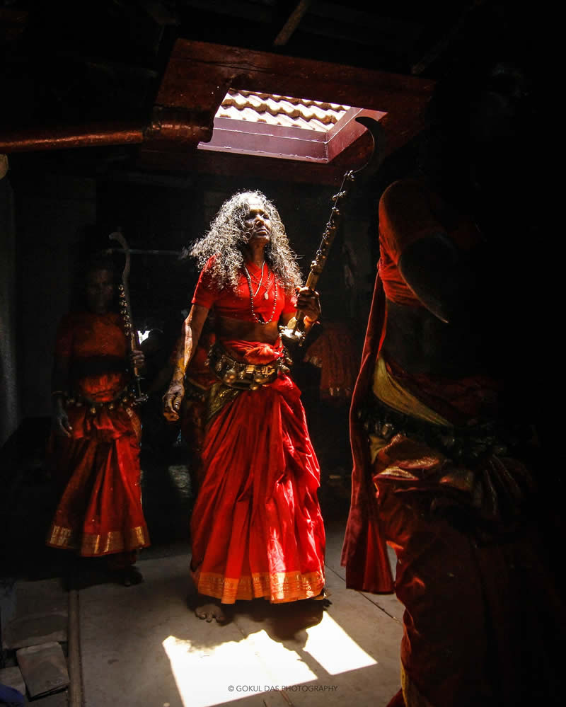Indian people with a ritual red dress