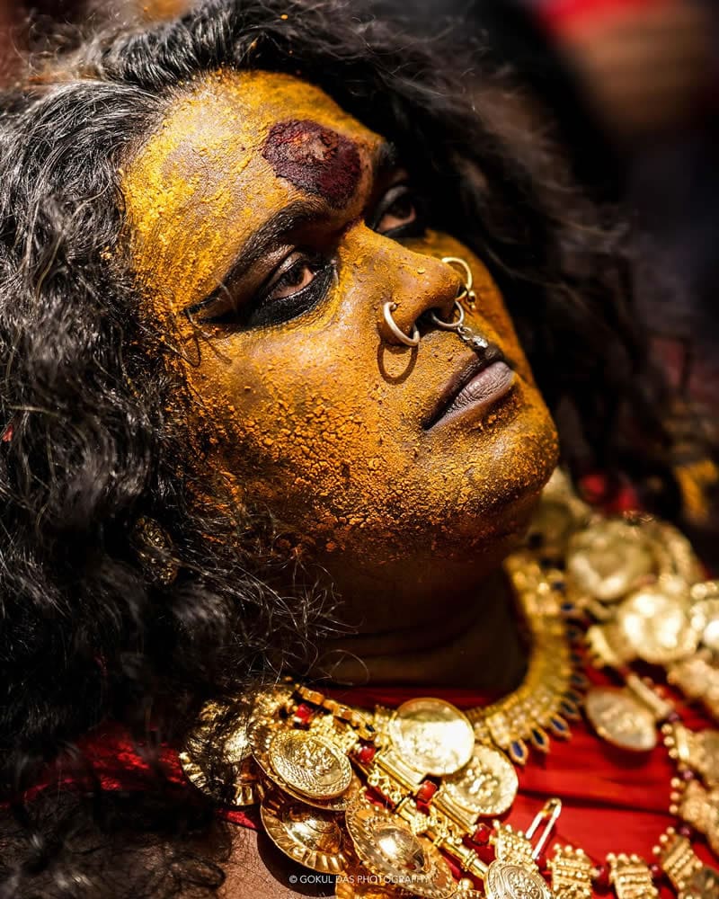 Portrait of a man with ritual makeup and rings in the nose