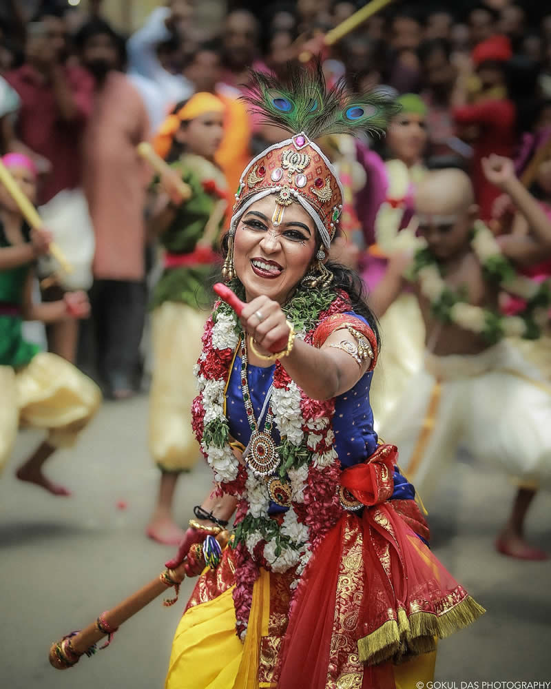 Indian smiling girl in a street celebration