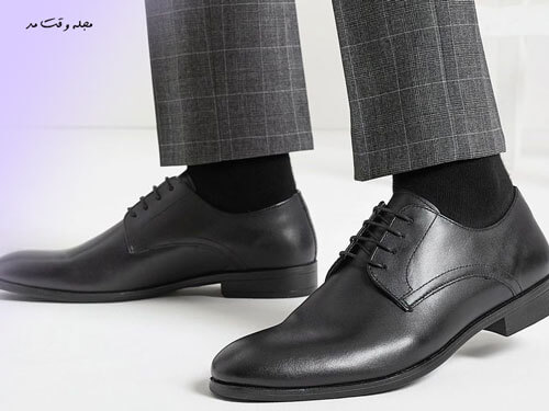 Black derby men's shoes with a suit, one of the types of shoe models, is suitable for men's suit.