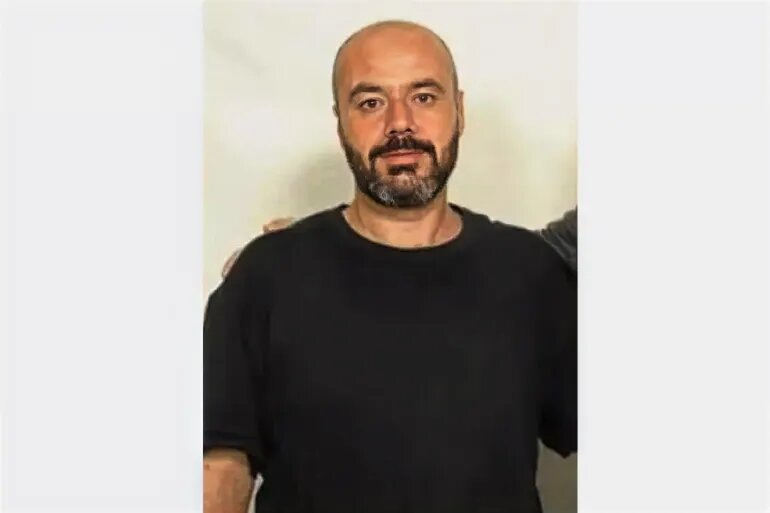 Who is the prisoner of a Palestinian free -prisoner who was sentenced to life in five times?