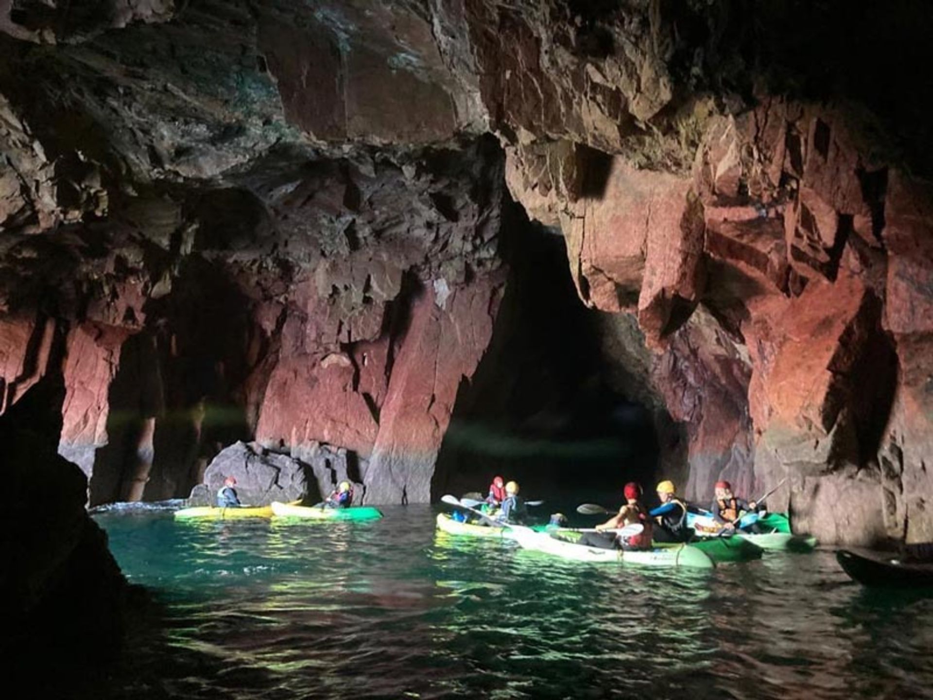 Kayak riding in the caves of the Ireland Island