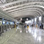 Buying a plane ticket at the airport