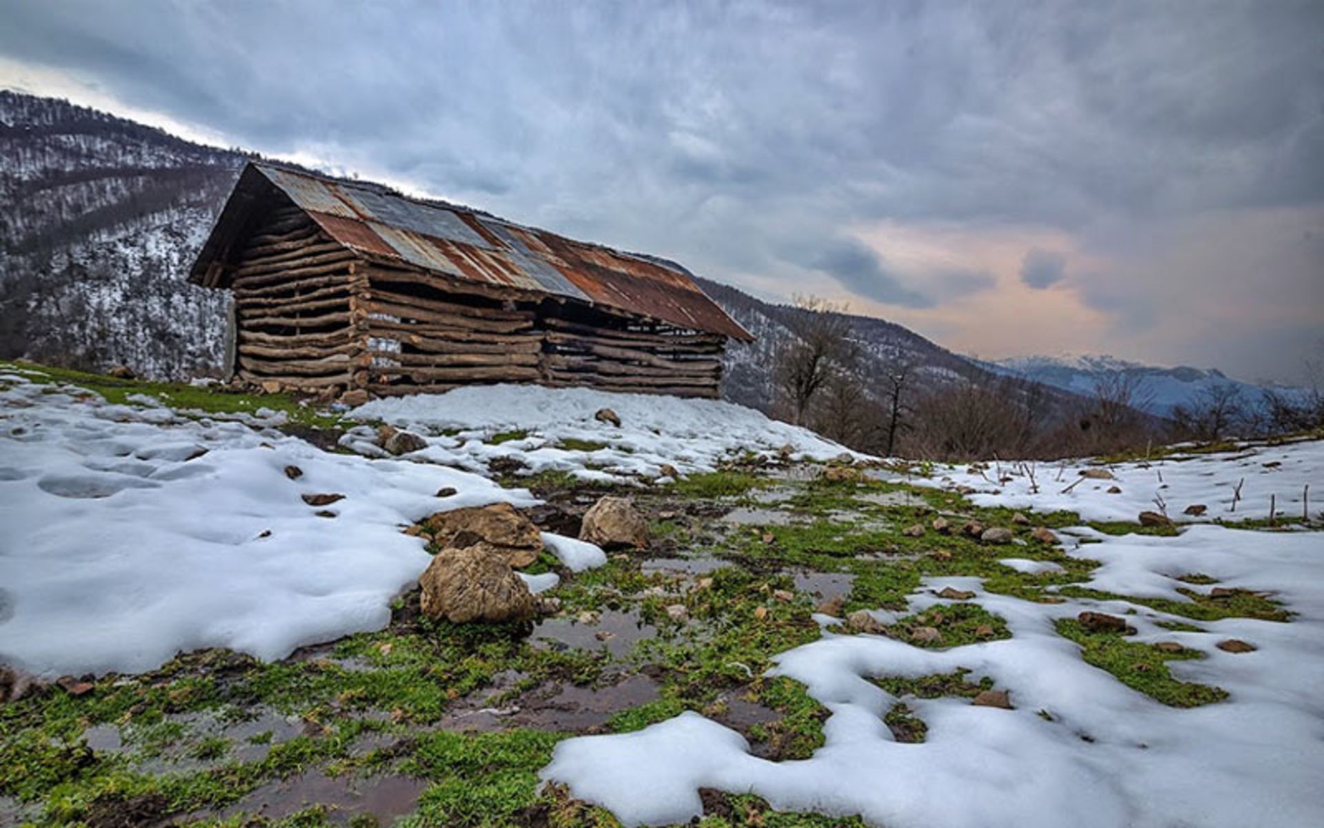 Wooden hut in the winter