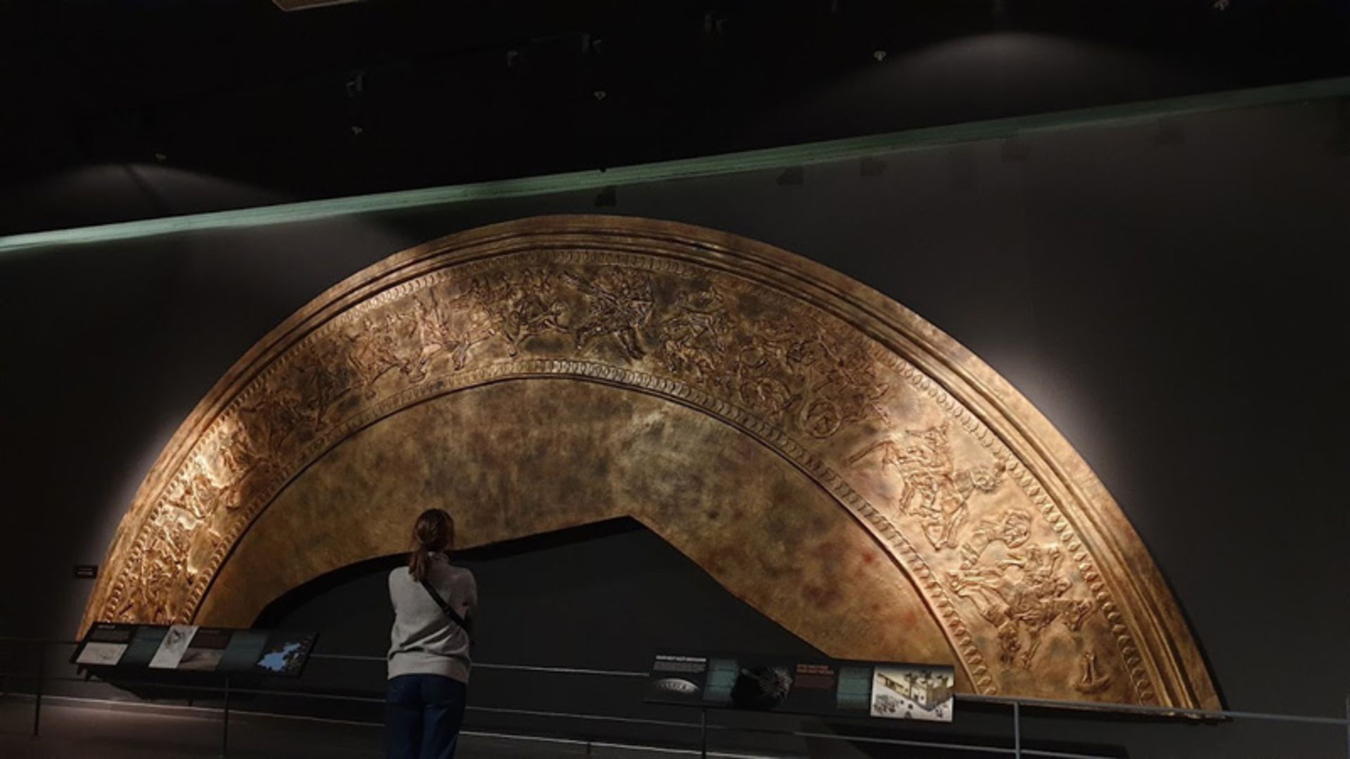 Woman Tourist watching Wan's ancient work