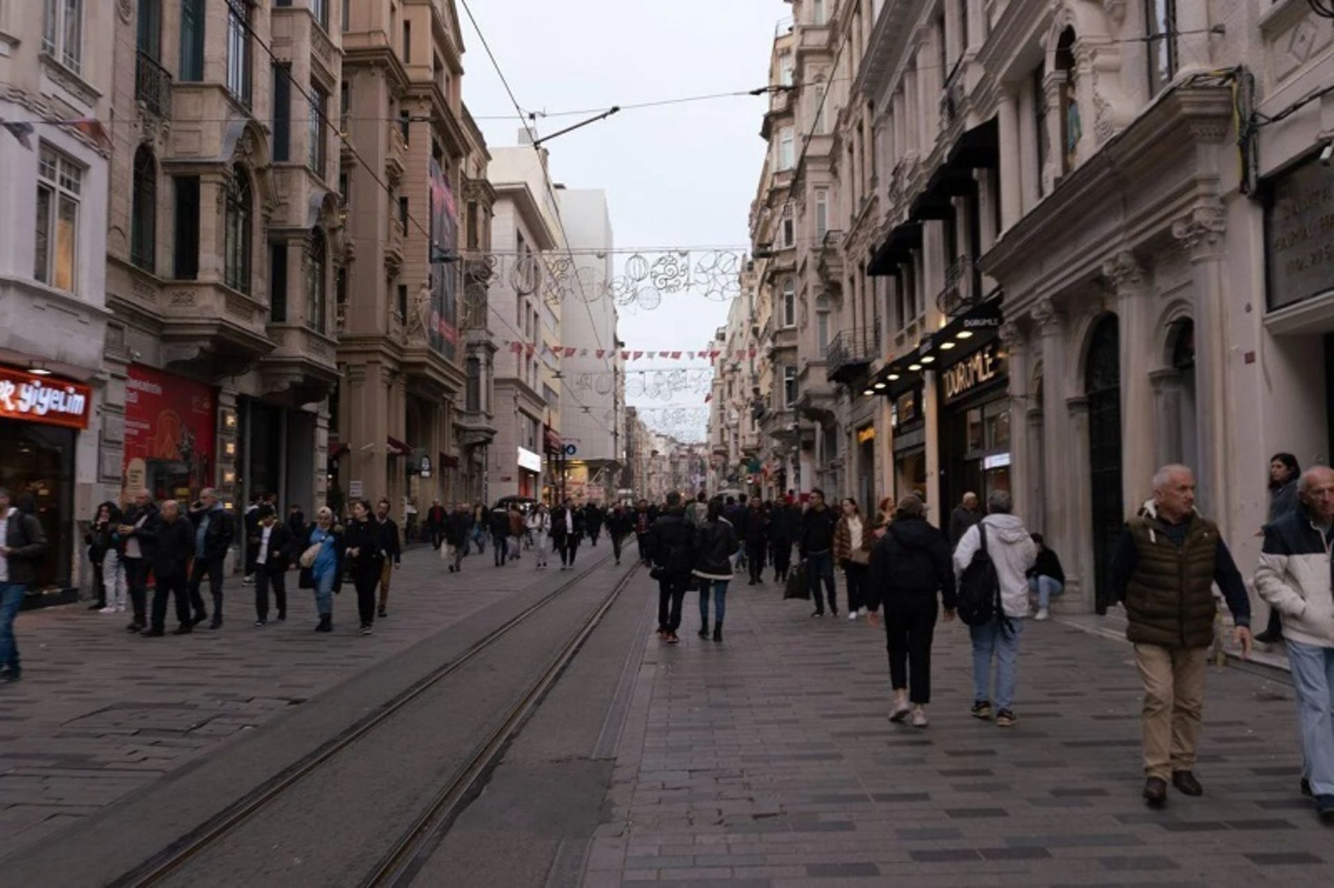 Tourists on Esteghlal Street