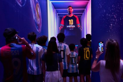 The presence of people in front of Messi's image at the Messi Exhibition Exhibition