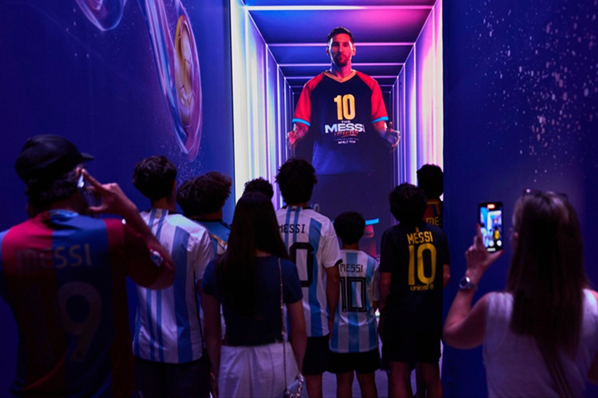 The presence of people in front of Messi's image at the Messi Exhibition Exhibition