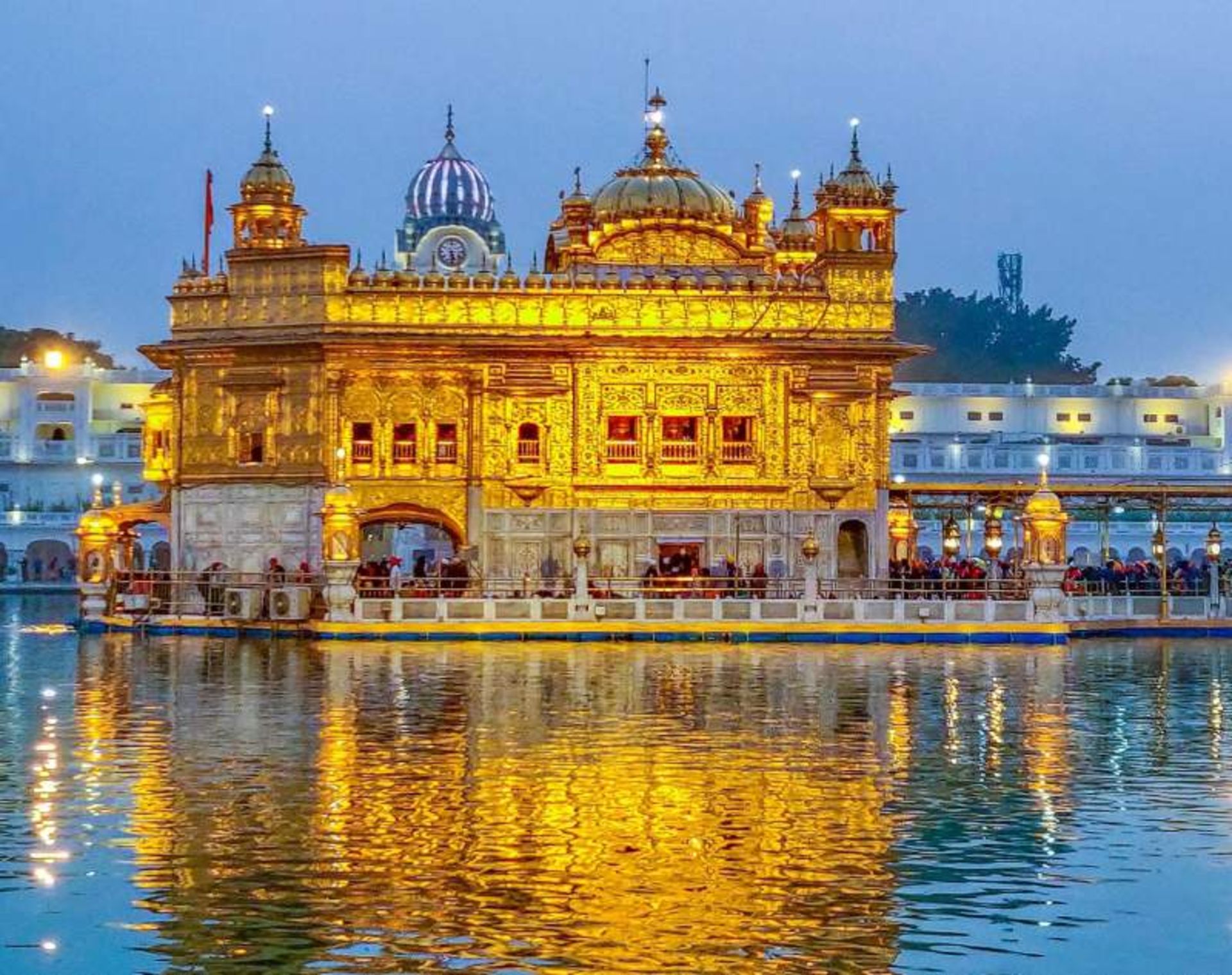Indian Golden Temple on the side of the river