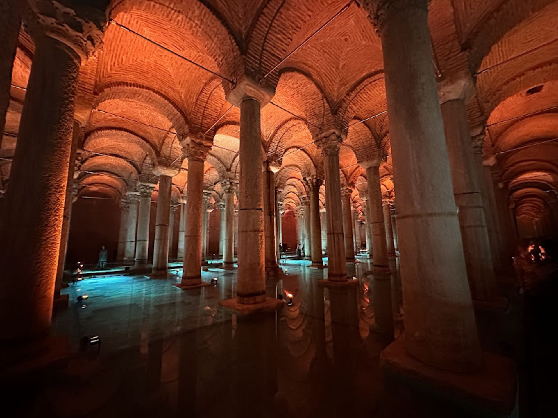 Basilica's waterfront water with red lighting