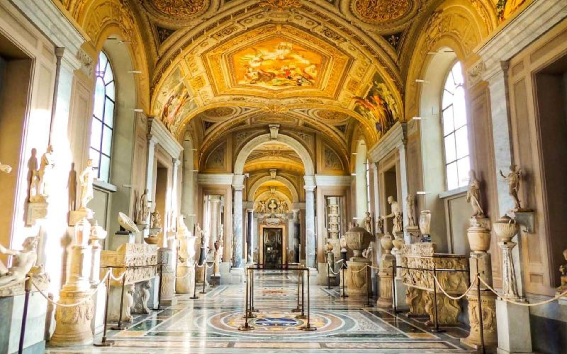 The interior of the Vatican Museum with different sculptures