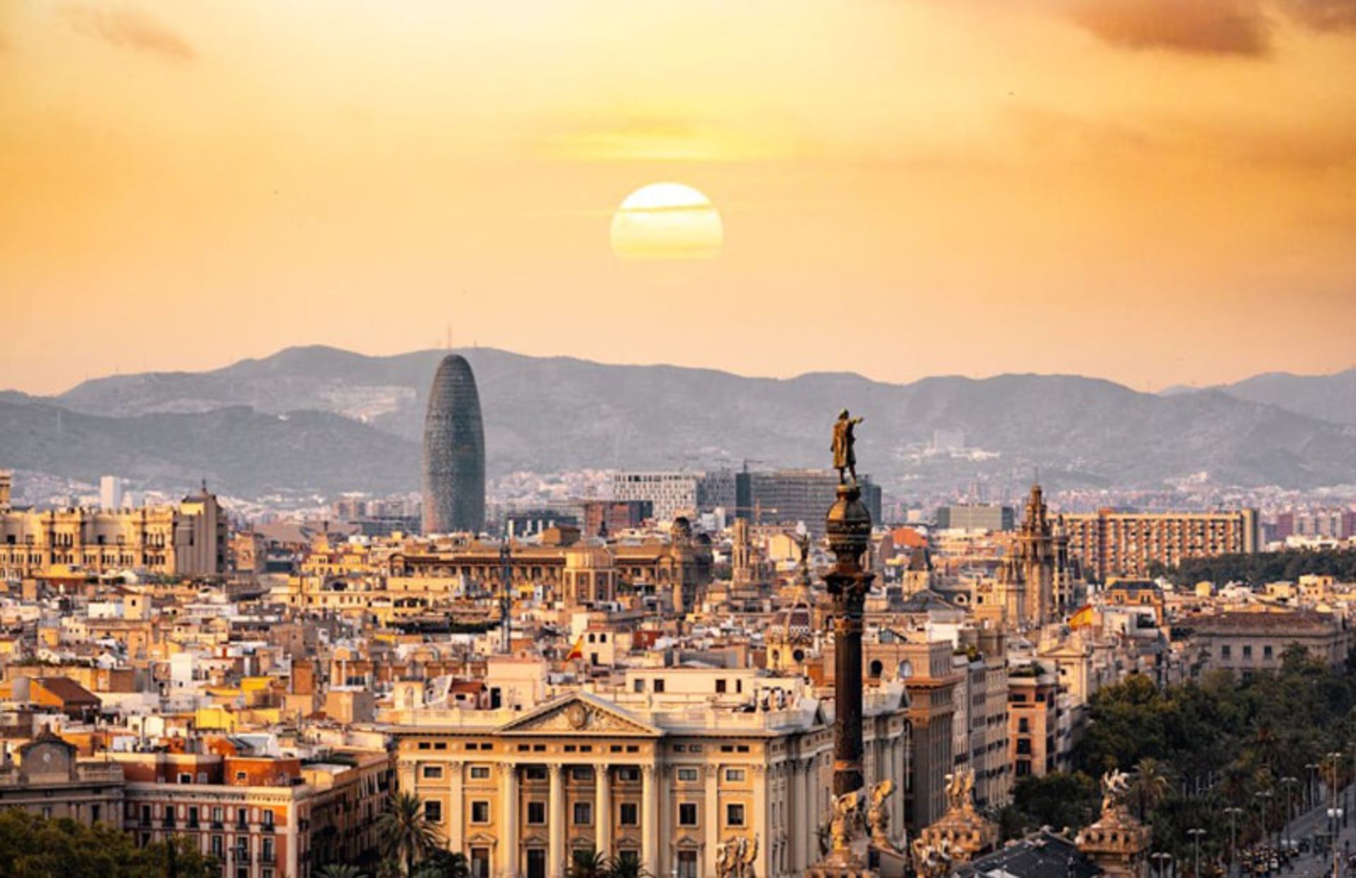 The prospect of Barcelona's city architecture at sunset