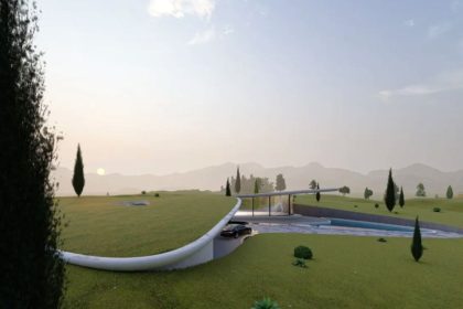 A house with a green roof in Noshahr