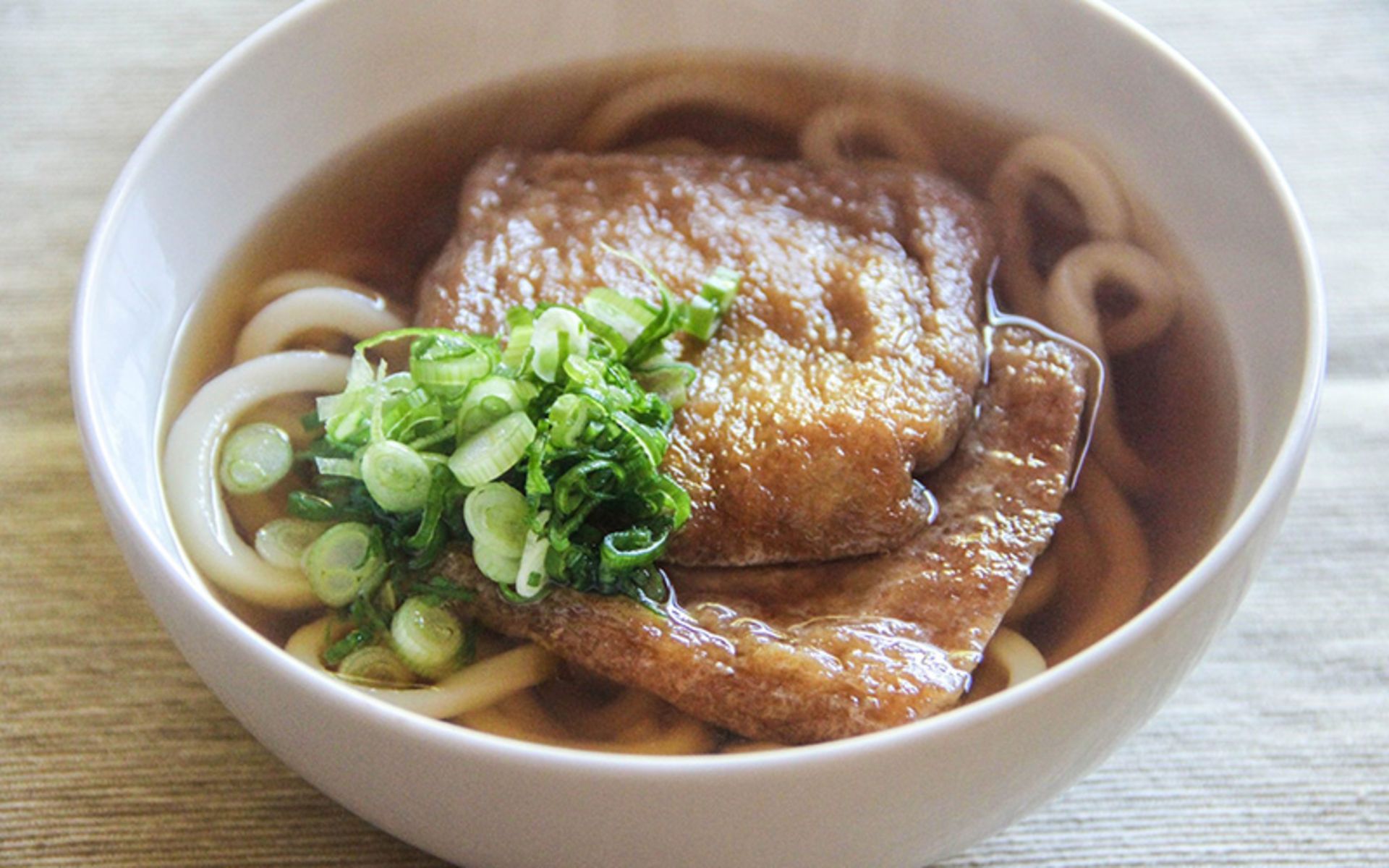 A bowl of Odon with vegetables