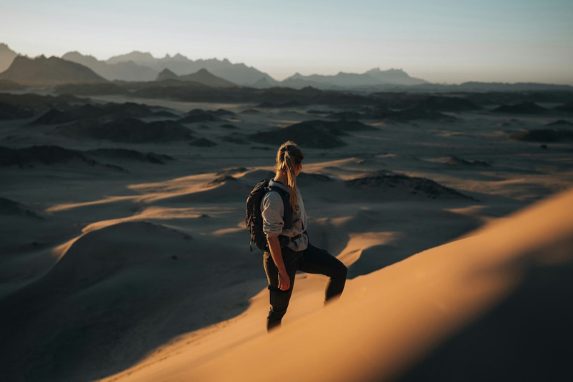 Tourist walking in the desert