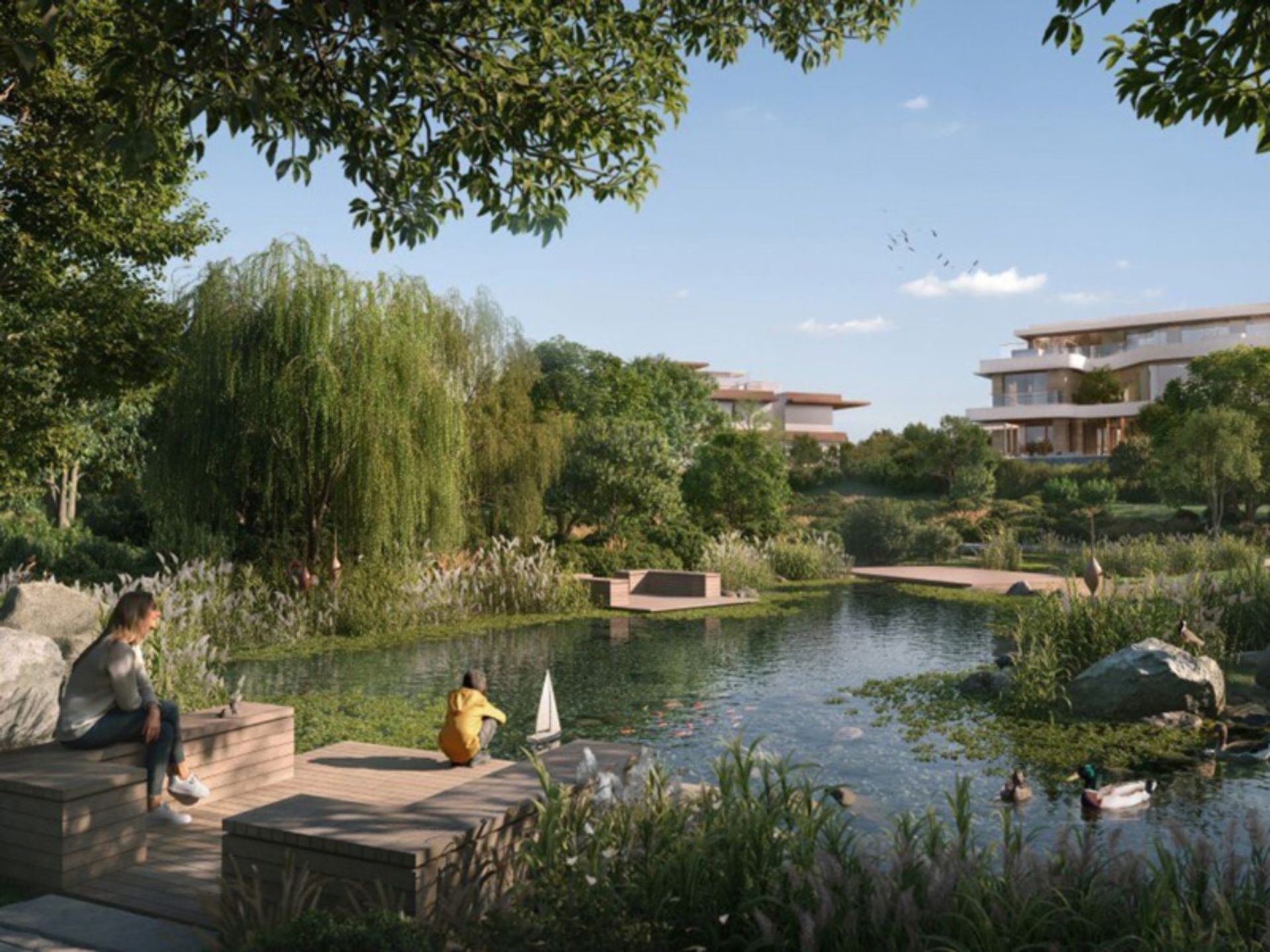 A child playing a wooden boat in the Wilds pond