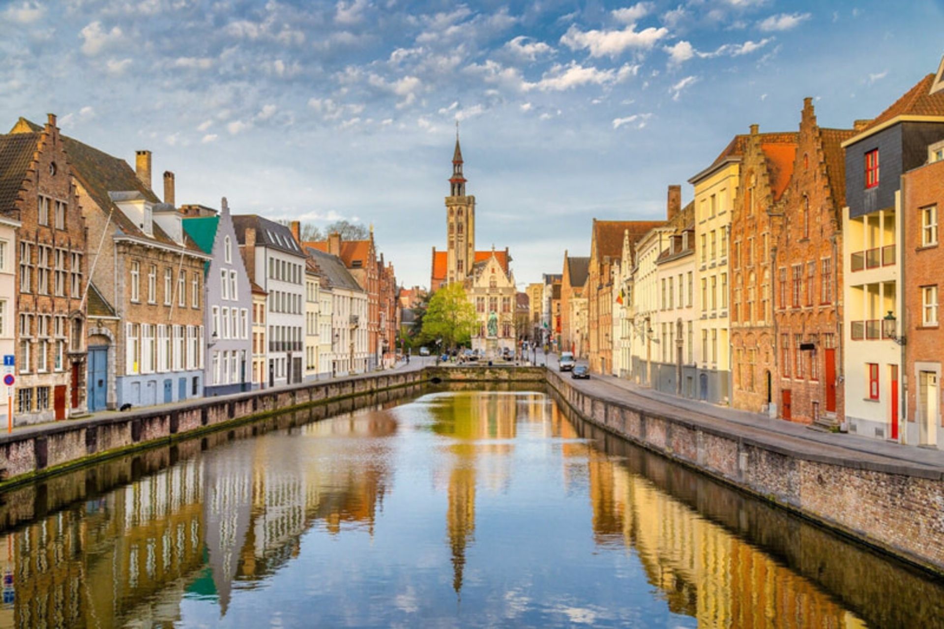Blue Canal in Bruges Belgium with historic buildings 