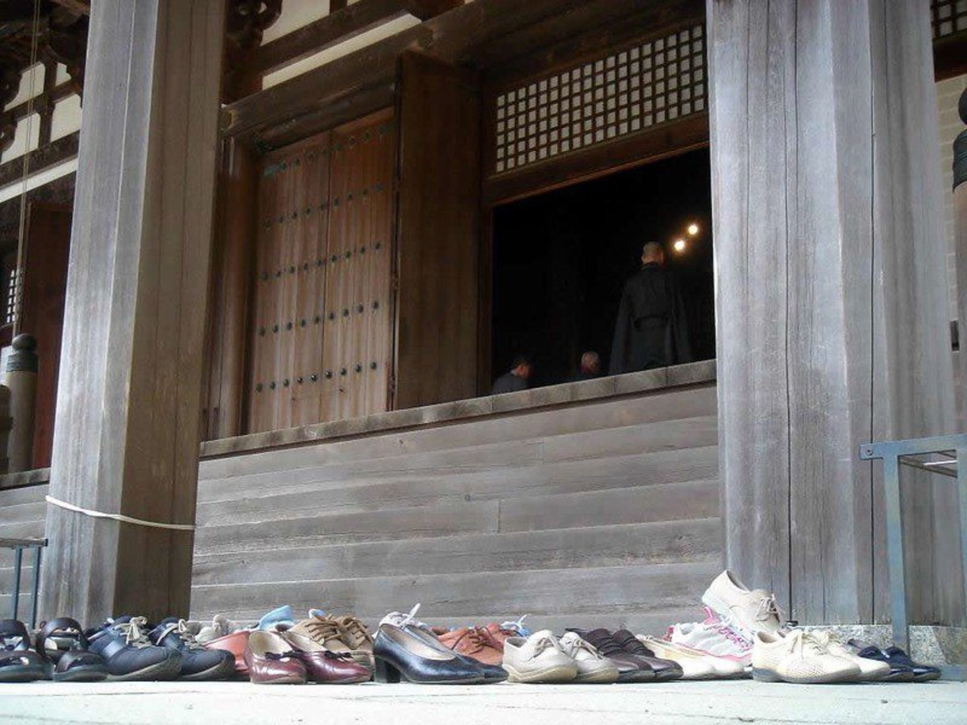 People's shoes on the temple in Japan