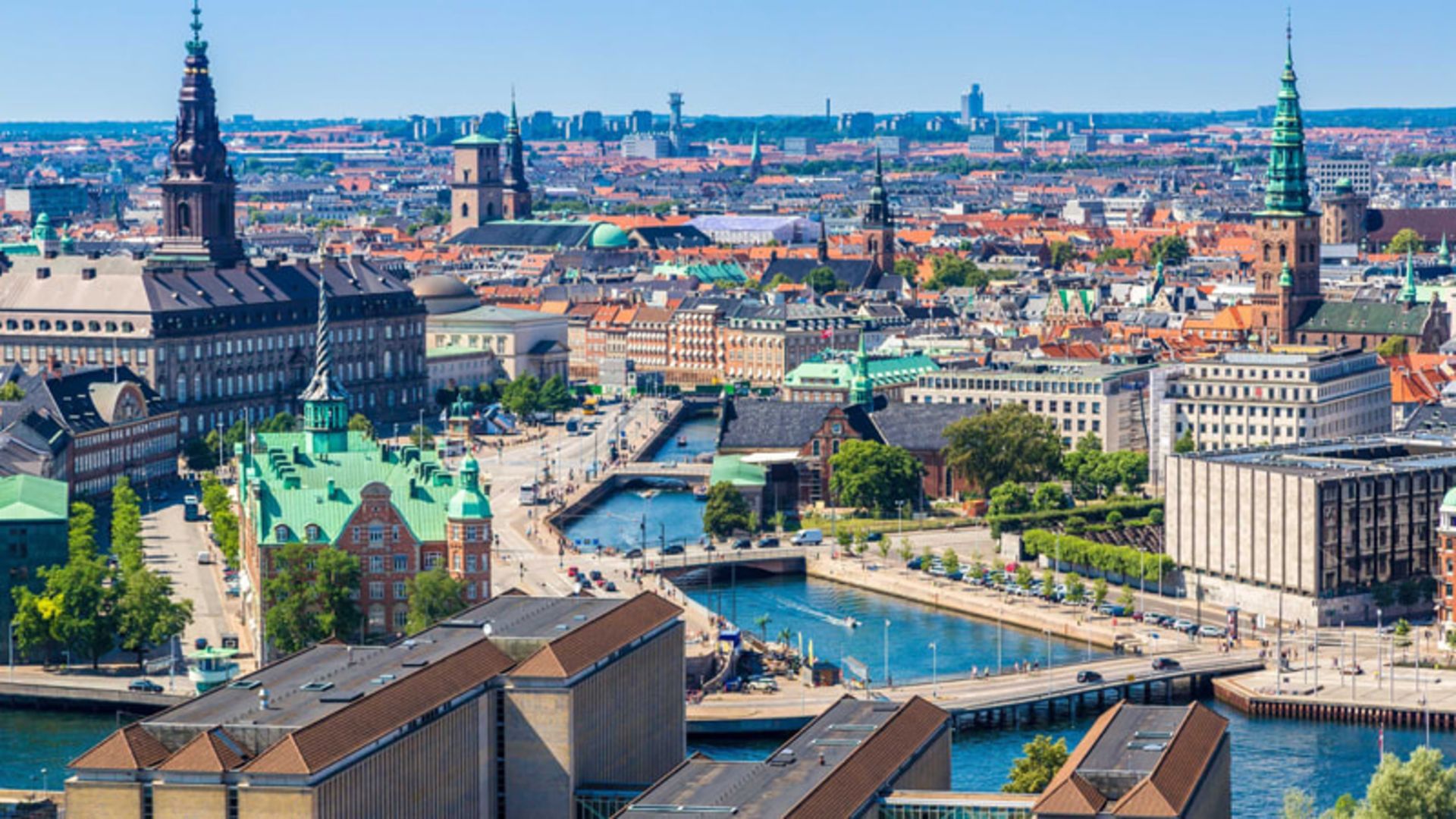 Copenhagen Denmark with water canals, historic buildings and tall churches