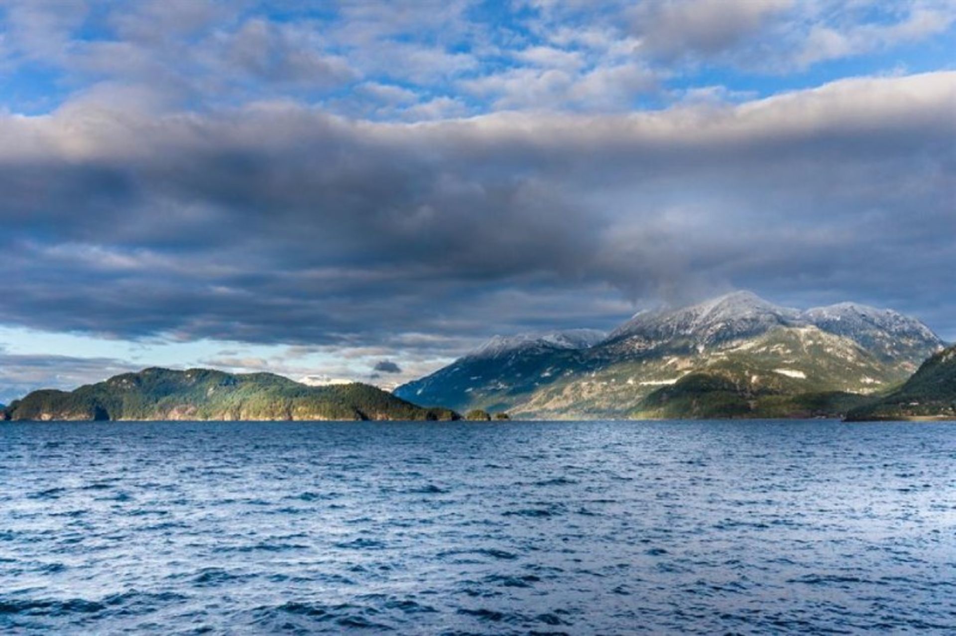 Lake Harrison and the surrounding mountains on the cloudy day
