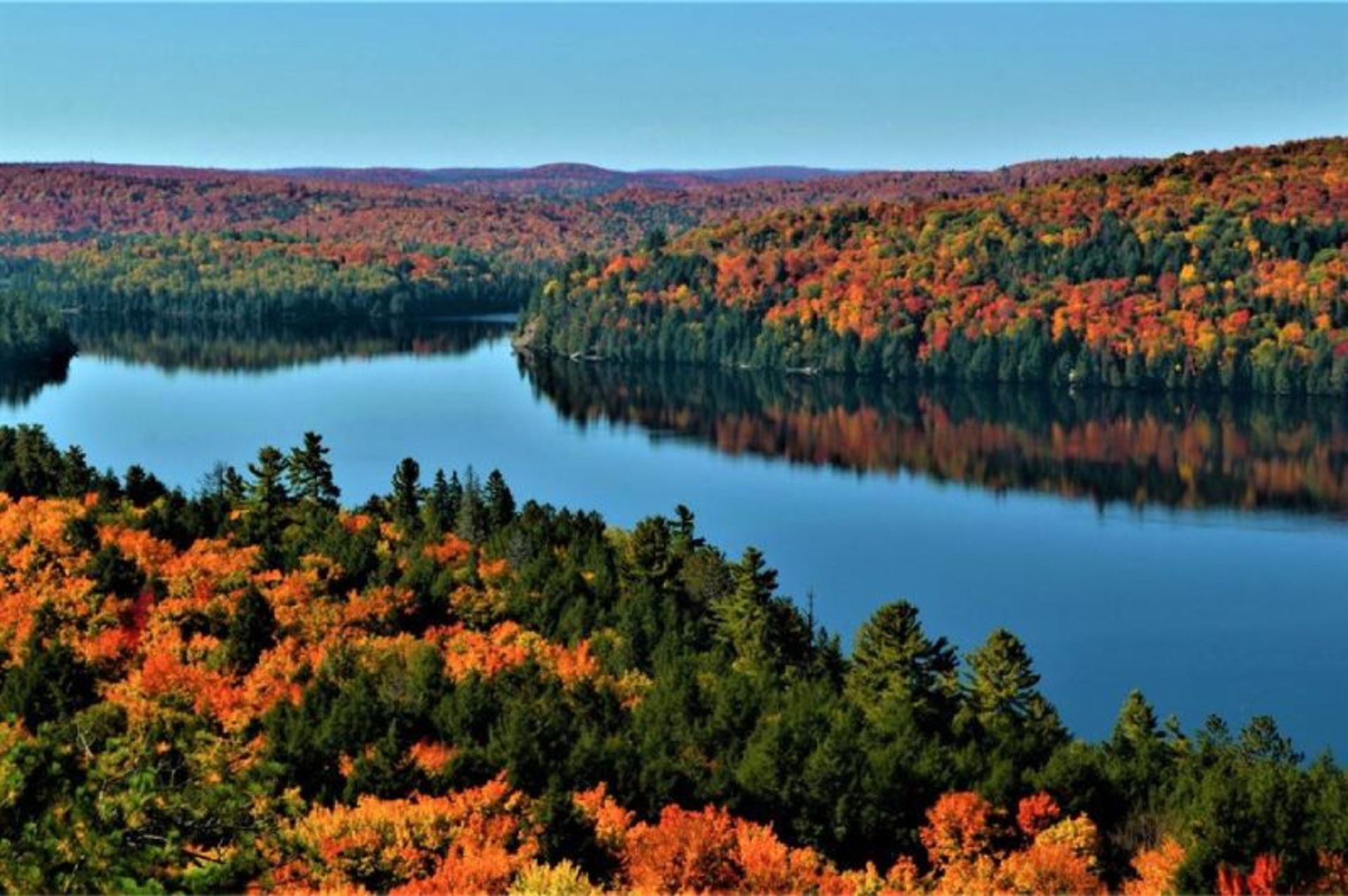 Lake Rock surrounded by colorful trees in Ontario