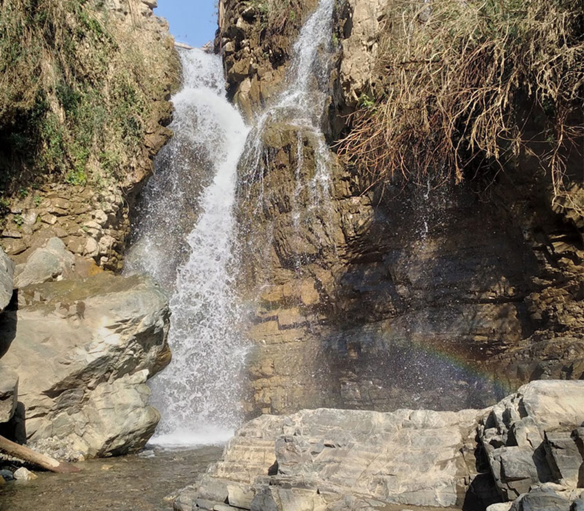 Water flow among the rocks of Siban Valley waterfall