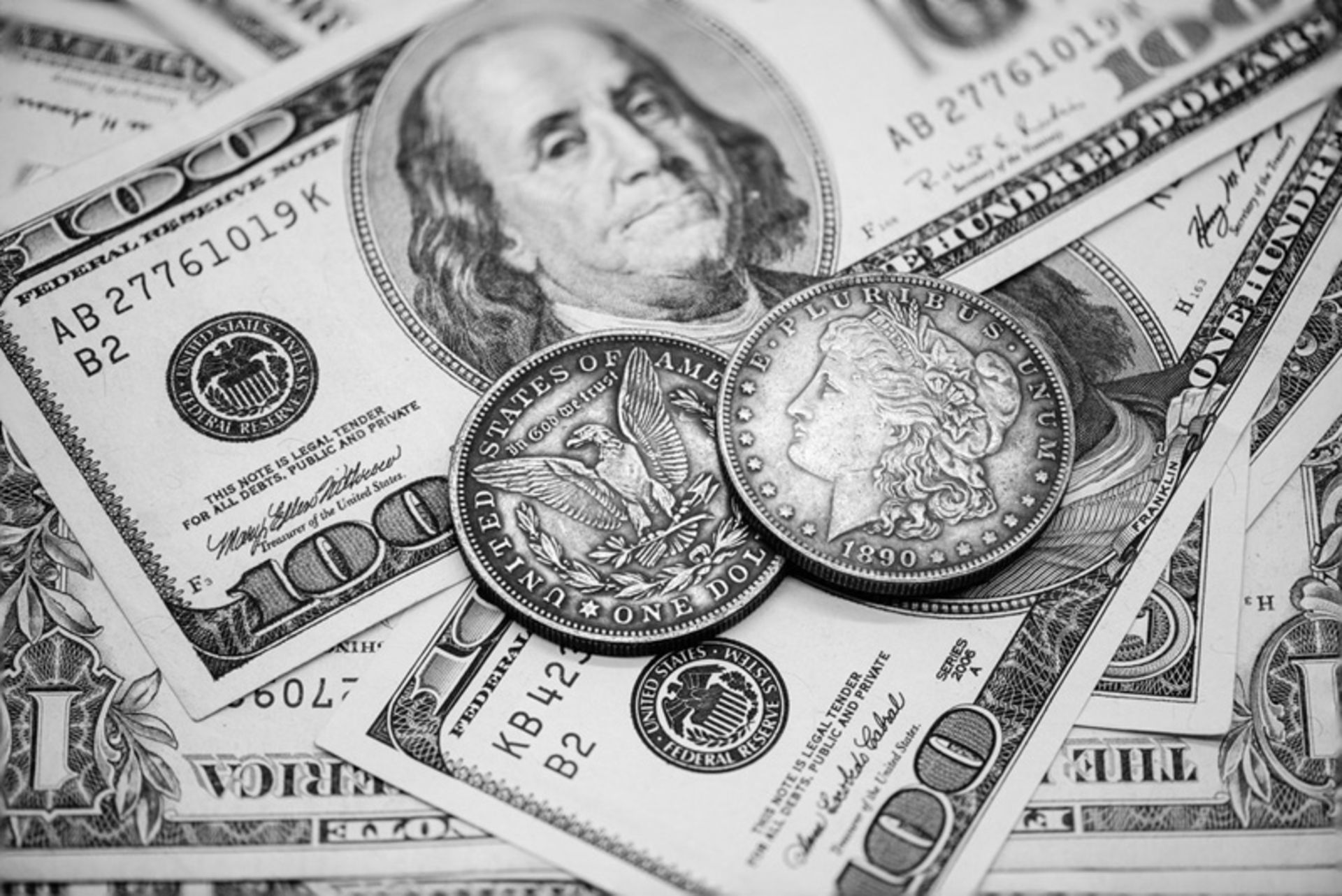   US $ 2 bills with two old silver coins