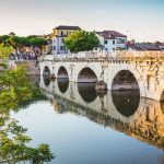 Tiberius Bridge in Remini, Italy over the river