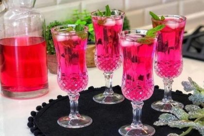 Pink Mohammadi flower syrup with ice and mint leaves