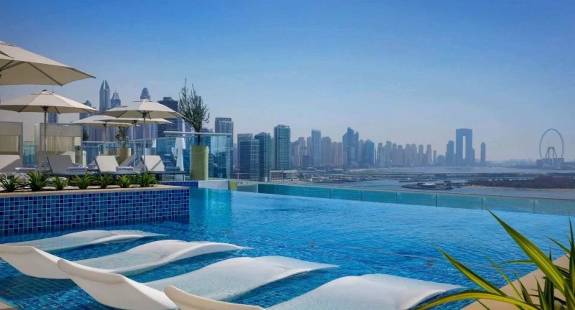 Pool beds, canopies and landscapes in the Roof Top Pool Dubai Dubai Hotel Dubai Collection