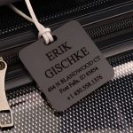 Tag of individual characteristics and individual information attached to the suitcase