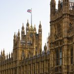 West Minister Palace with British flag