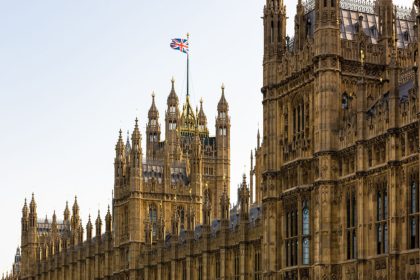 West Minister Palace with British flag