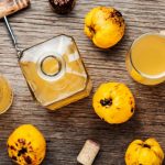 Syrup to lemon with fruit to fresh wooden table