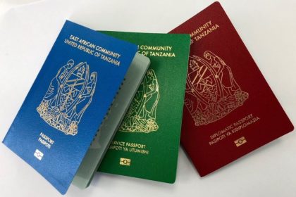 Three electronic passports with blue, green and crimson