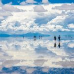 Reflection of blue sky and white clouds in the desert desert