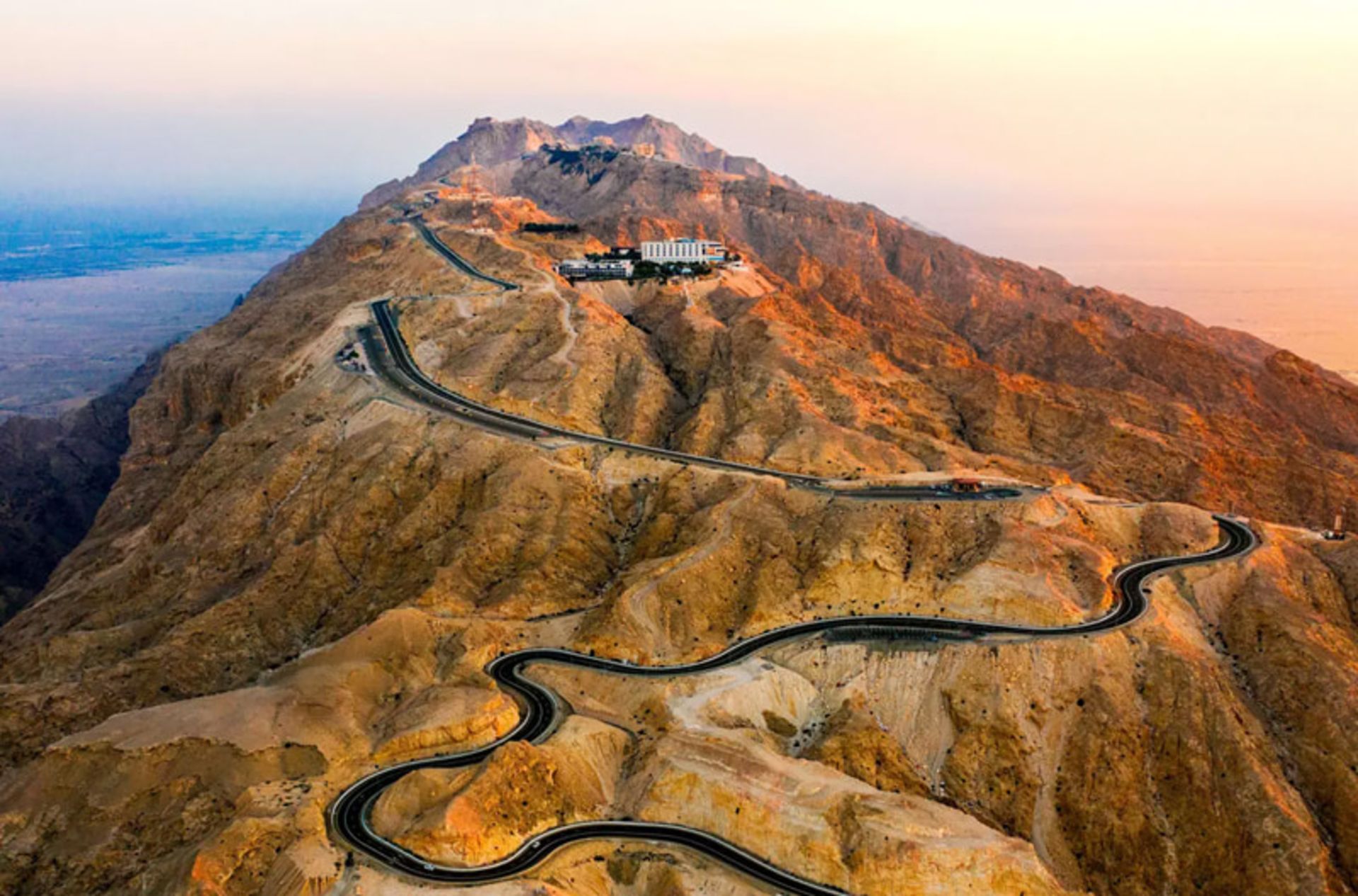 A winding road towards the summit of Jebel Kazat in Abu Dhabi