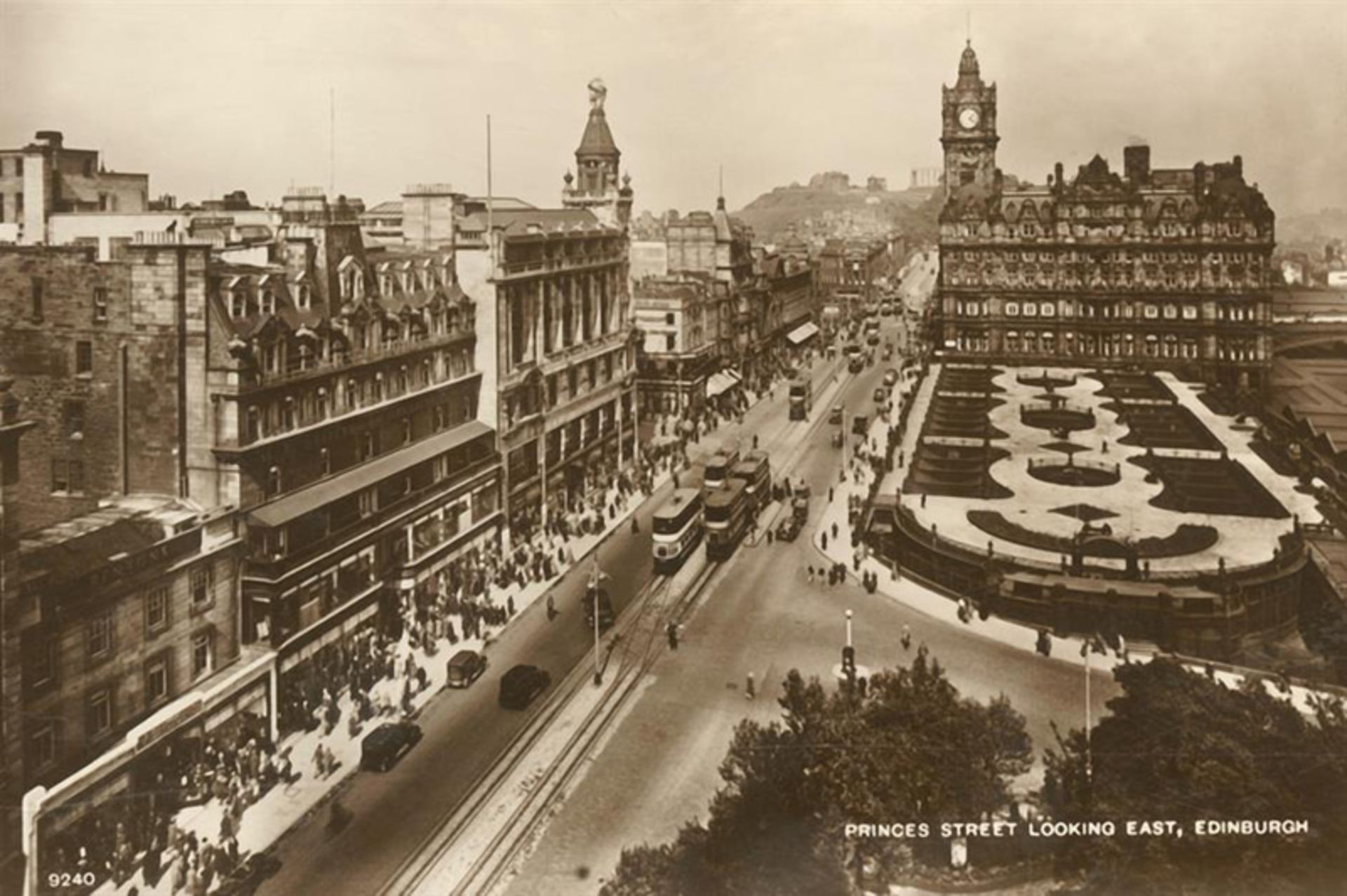 Old photo of street with classic buildings in Edinbro, Scottish