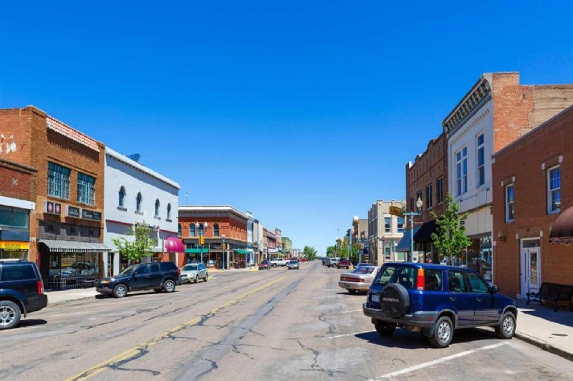 Cars and buildings on Larami Second Street